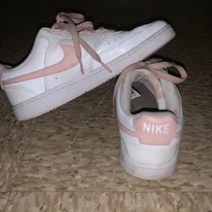 pink and white Air Force 1s